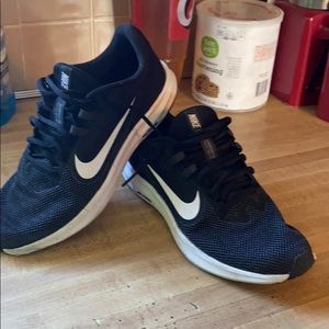 Black Nike running shoes